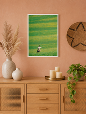 Woman Running in Green Field Wall Art Print - white framed